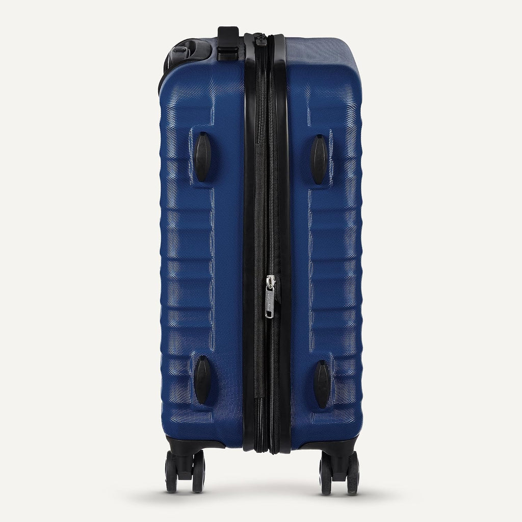 Amazon Basics 30' Hardside Large Checked Luggage with Multi-directional Wheels, Expandable for Up to 15% More Space, Scratch-Resistant Hardshell, Navy Blue