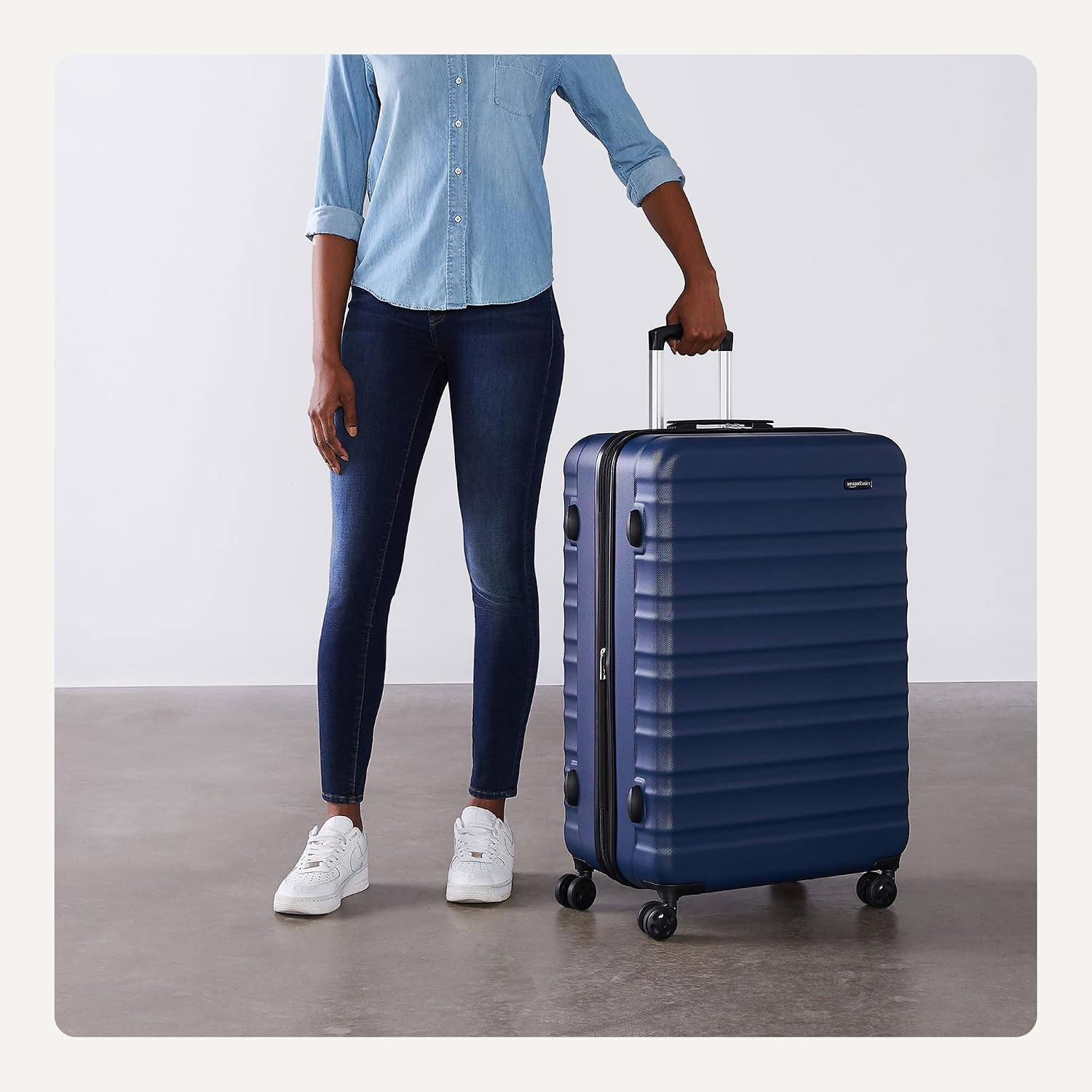 Amazon Basics 30' Hardside Large Checked Luggage with Multi-directional Wheels, Expandable for Up to 15% More Space, Scratch-Resistant Hardshell, Navy Blue