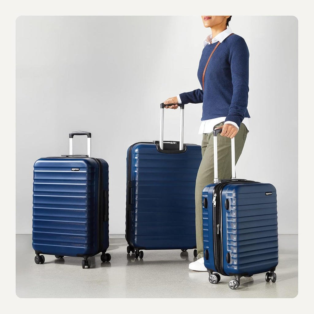 Amazon Basics 3-Piece Hardside Expandable Luggage Set (21' Carry-On, 26', 30'), Spinner Suitcases with Multi-directional Wheels, Scratch-Resistant Surface, Navy Blue