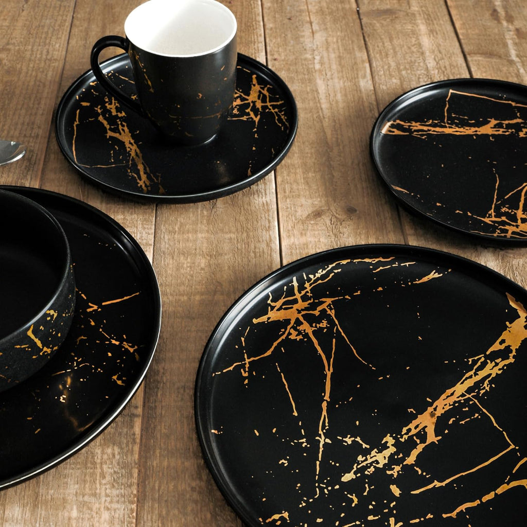Stone Lain Porcelain 16-Piece Dinnerware Set – Black with Gold Splash, Service for 4 – Elegant Dinner Plates, Salad Plates, Bowls & Mugs – Modern Round Tableware, Dishwasher Safe